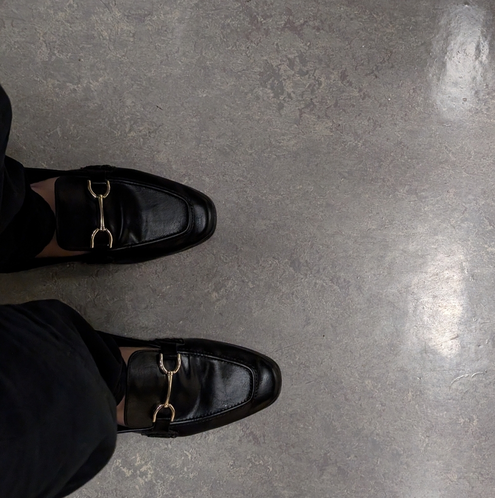 Black Leather Loafers with Silver Buckle